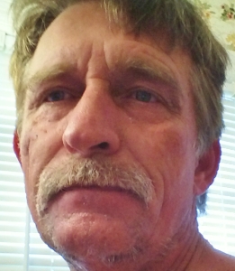 His beard is almost gone. He got a hair cut today too.