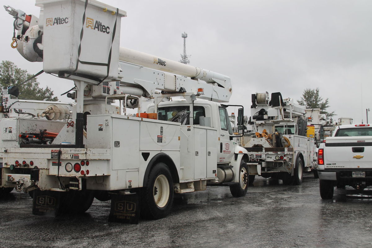 Utility trucks line up to support those who lost their power during Hurricane Irma